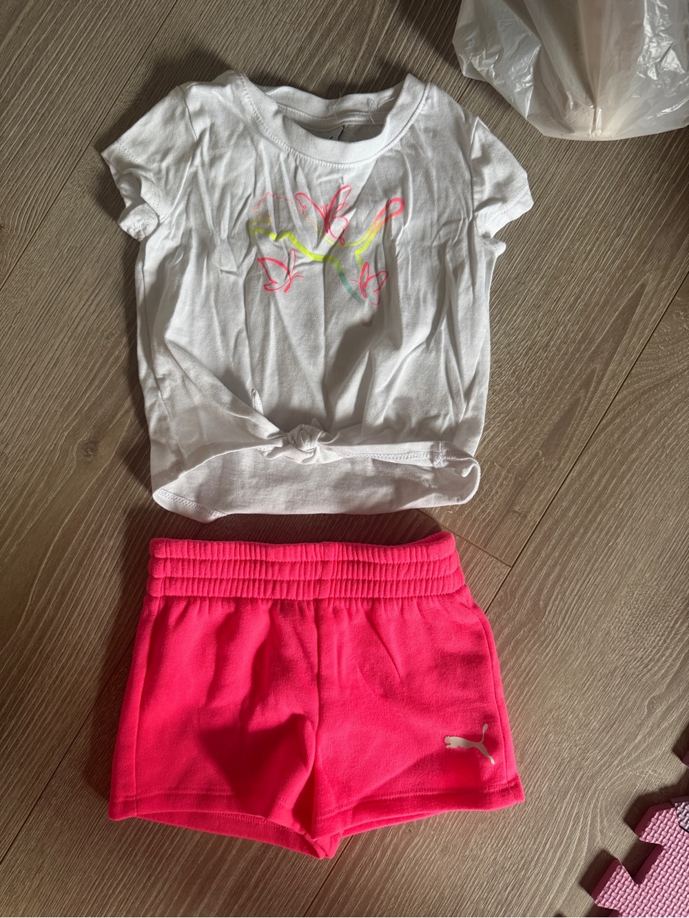 Puma White Knot Tee with Neon Butterfly and Hot Pink Shorts
